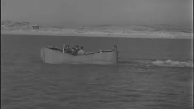 Duplex Drive Valentine tank and Porpoise ammunition sledge launched from L.C.T. Mk. III