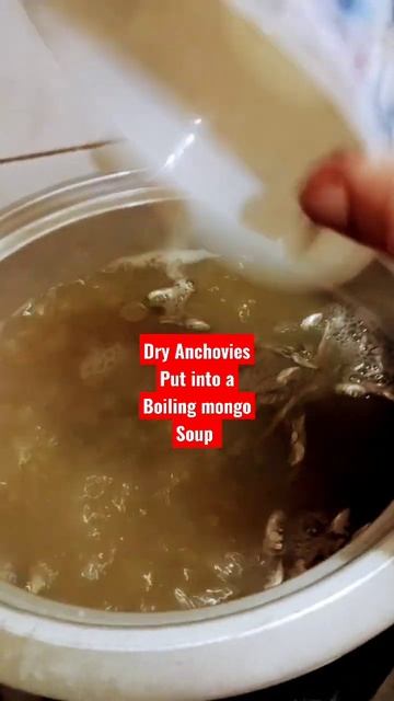 The dry anchovies put into a boiling monggo soup.. by Tate Blogs