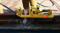 Aluminothermic welding (thermit welding), Scarfing the excessive metal