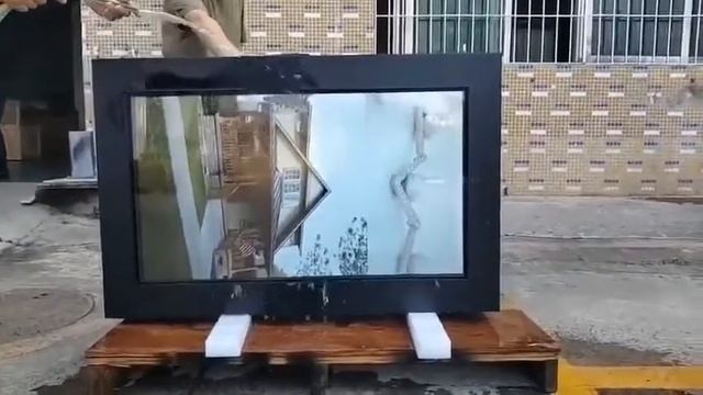 55inch wall-mounted screen during water-poof test (alice@lcdhome.live) whatsapp: 0086 13113688179