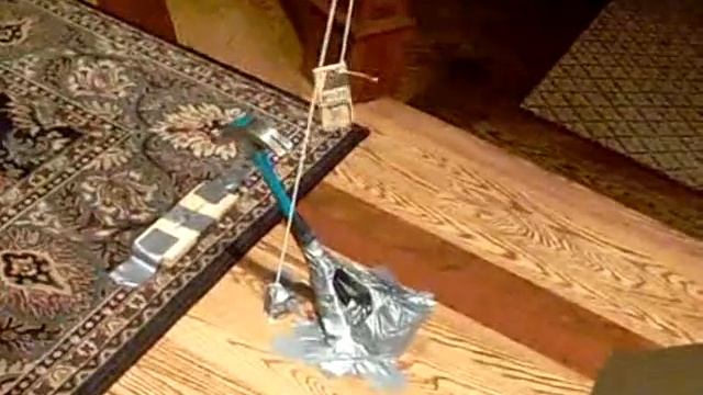 Rube Goldberg Project: Hitting a hammer by Rich