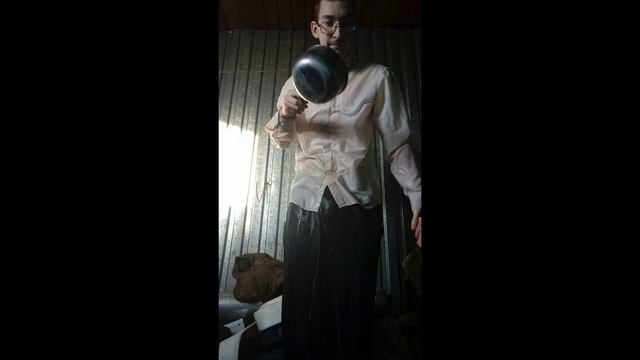 Skater taking a shower fully clothed