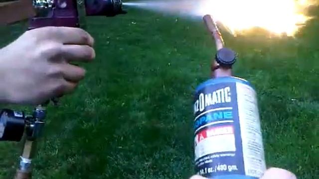 Paint sprayer shooting gas fireballs