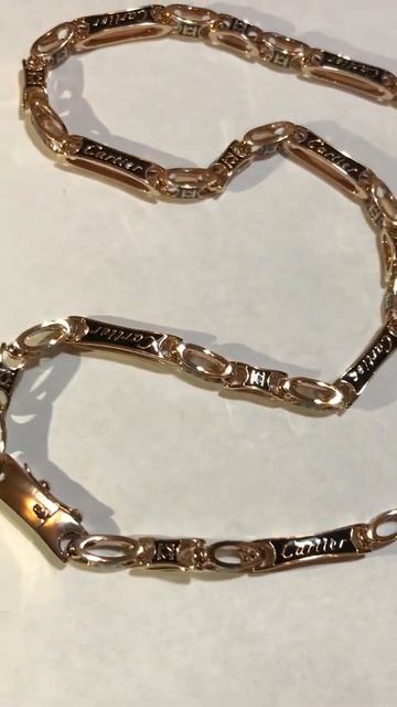 Цепочка мужская из красного золота сделана в стиле Cartier .