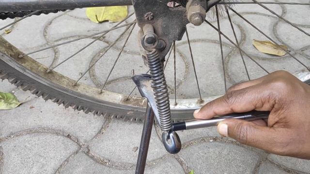 Helical tension spring