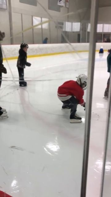 Madis first learn to skate- in hockey gear
