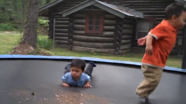 KMS & LPS on the trampoline at 2 yrs