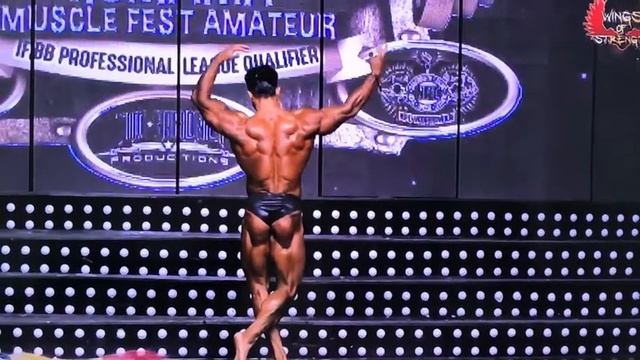 Vahid badpey posing at Romania muscle fest pro (2020)