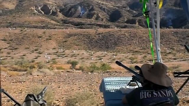 The wife shooting a .50 cal bolt action @ Big Sandy Oct 09