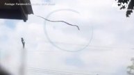 Snake seen jumping off roof dubbed 'Most Australian Thing Ever'