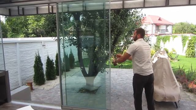 Раздвижная система стеклянная безрамного остекления