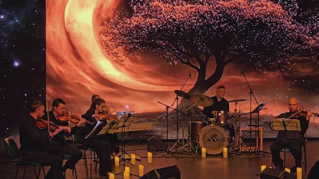 Концерт "Свидание в Париже при 1000 свечей" с участием камерного оркестра HighTime Orchestra.