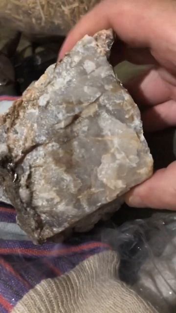 Idk but it looks like some kinda pyrite and quarts? Or calcite?