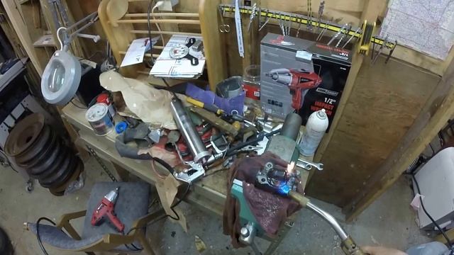 1949 International KB2 Pickup Brake work using wax to loosen bolt.