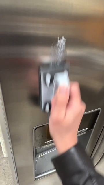 Removing #scratches on a #refrigerator door with the power of Scratch-B-Gone! #diy #stainlesssteel