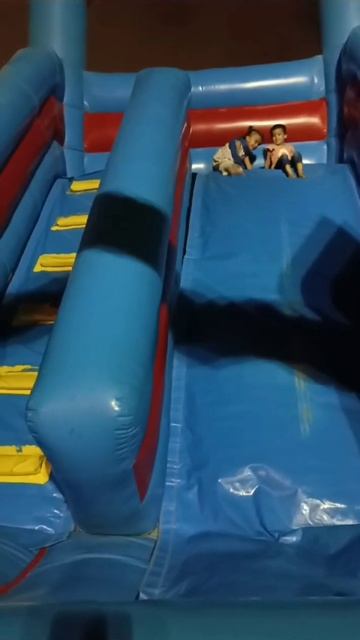 Dania and her cousin fun on jumping castle slide | Funny Sliding