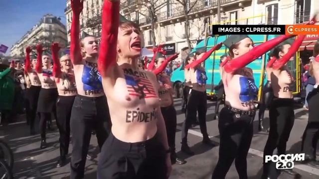 Париж,8 марта.Femen устроили нацисткую акцию протеста против мировых лидеров