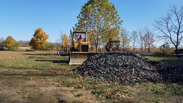 Bulldozer vs. Backhoe vs...Tractor?