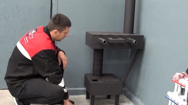 Печь на отработке с водяным контуром для теплого пола.