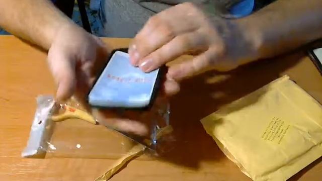 Распаковка чехла на Samsung J1