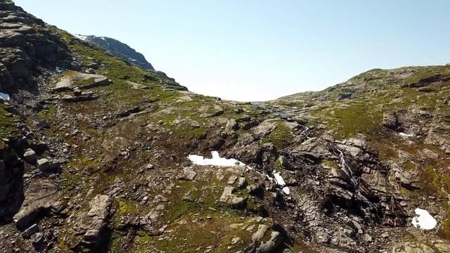 different aerial views of mountains and body of water