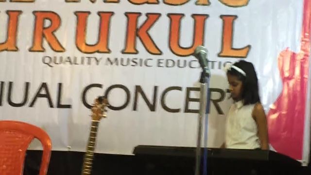 Shyla singing at TMG concert