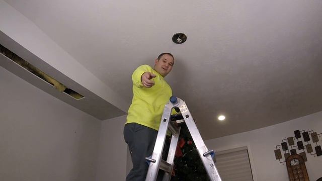 Removing a can light to run wires in the ceiling
