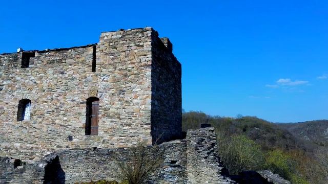 Fimi X8 SE exploring a medieval castle ruin and reconstruction of a celtic height settlement.