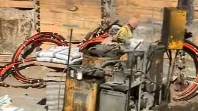 lifting cement bags.wmv