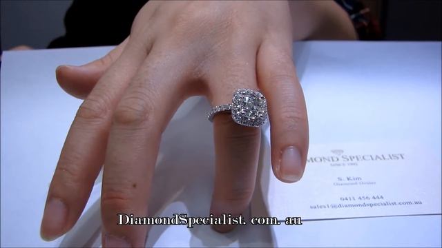 1.5 carat cushion cut diamond with halo setting