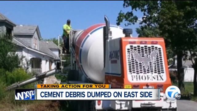 Woman angry over cement truck dumping