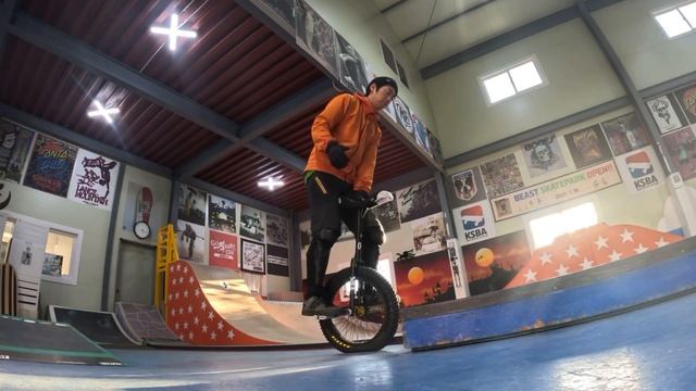 Unicycle. Seat-Out-Front Forward Hopping & Riding Practice.