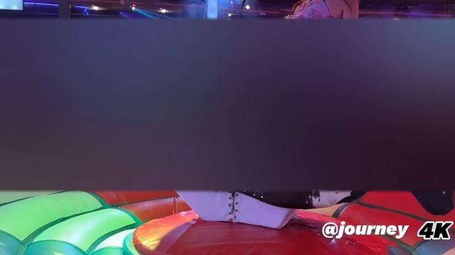 Girl in Flowery clothes Riding on a Mechanical Bull in Benidorm  4K | Part 2