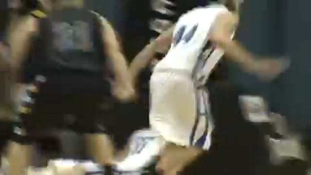 Basketball Player Wears Helmet