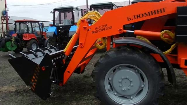 Трактор МТЗ 92П Беларус с экскаватором Блюмиг и погрузчиком с челюстным ковшом