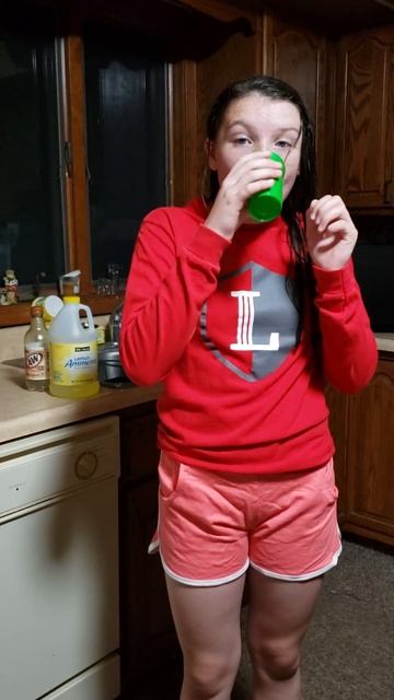 Gracie is wearing pink with red but she insists its orange and long sleeve in summer.
