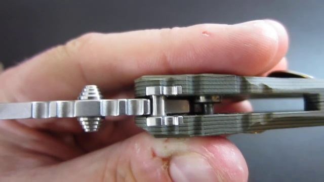 How Does a Button Lock on a Knife Work?