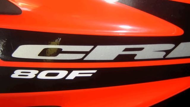 my crf 80 (cool now with stickers)!!!!!