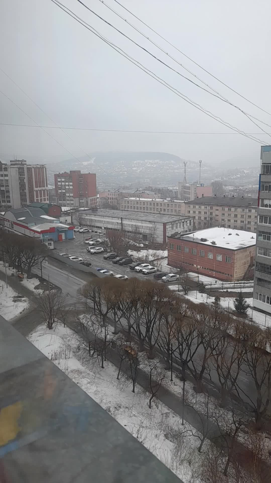 Город