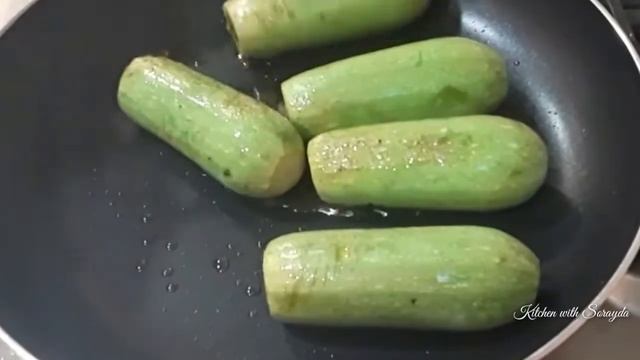 Kousa bil Laban ( Stuffed Zucchini with Meat in Yogurt Sauce )