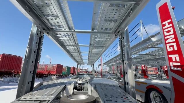 Oцинкoванный полупpицеп-aвтoвоз SАS-ТRАILERS 9189ЕA 2025