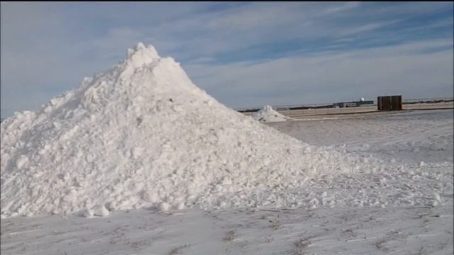 Stacking Snow with Boss B8 Pusher on Bobcat  - Fargo Snow and Ice Management