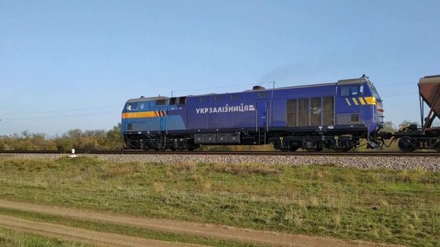 ТЕ33АС-2014 с грузовым составом следует по перегону Николаев Пасс-Гороховка