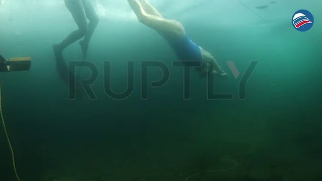 Ледяное достижение: россиянка преодолела рекордные 122 метра подо льдом в условиях сурового холода