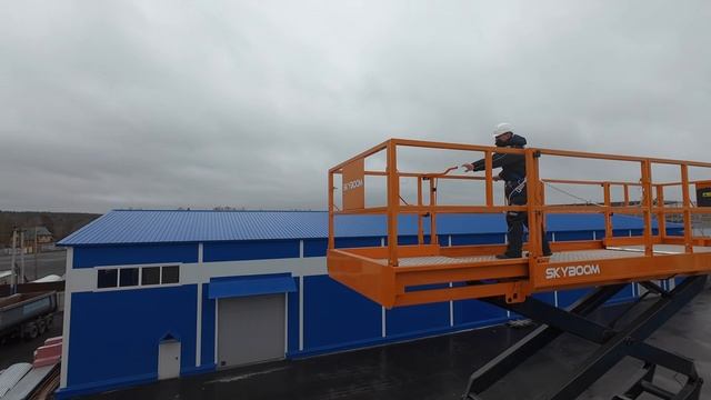 Дизельный ножничный вездеходный подъёмник SKYBOOM SSL-18RT