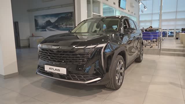 Geely Atlas. Unbounded Black / Черный металлик.