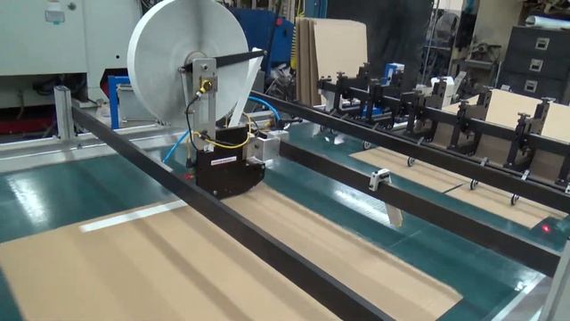 Pack-Smart Double side tape application on corrugated