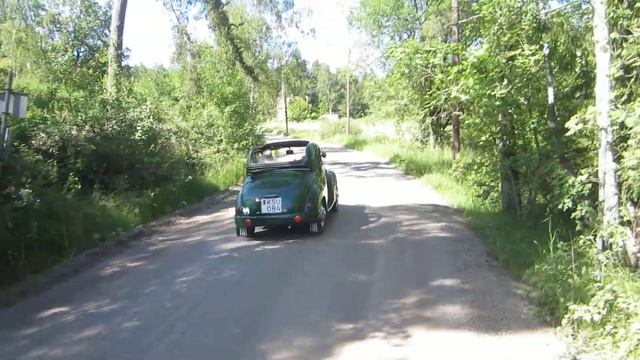 Classic car: Fiat 500C passing by