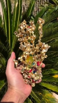 Pouring molten metal into containers filled with water beads