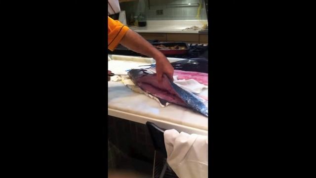 Chef Salih Hashim Cutting Up Fish
